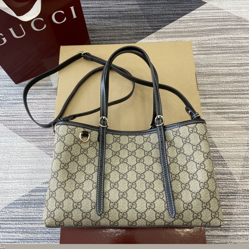 G*u*i shopping bags